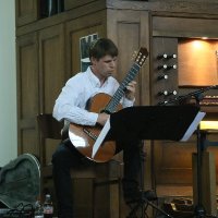 Wouter Moerman op het recital voor orgel en gitaar